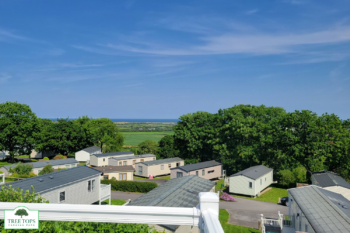 Carnaby Glenmoor 3 bedroom lodge with views for sale at Tree Tops Caravan Park in North Wales