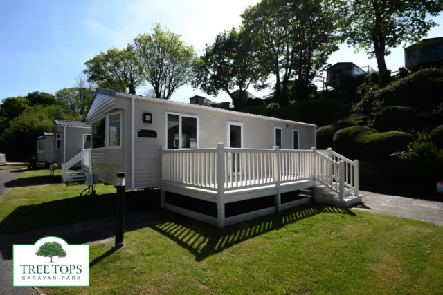 ⭐️ FOR SALE! ABI Summer Breeze Deluxe 2 bedroom caravan at Tree Tops Caravan Park in North Wales! ⭐️🌳 PRICE: £25,995.00Light and spacious throughout, the 2017 ABI Summer Breeze Deluxe is a fantastic example of a pre-owned and pre-loved caravan!This gorgeous 2 bedroom caravan comes with a good sized uPVC deck to the side – ready for you to set up the BBQ and relax in your sunlounger!⭐️HIGHLIGHTS:
✔️Good-size UPVC decking to the side
✔️Light-filled lounge with large, comfy corner sofa (with pull-out bed), log-effect electric fire, freestanding dining table and stools, display/storage cabinet, and large bay window to front
✔️Stylish kitchen with integrated gas oven and hob and microwave, freestanding fridge/freezer, and handy coat/storage cupboard
✔️Bright and spacious master bedroom with double wardrobe, dressing table and stool, open shelving, and ensuite WC
✔️Bedroom 2 with twin single beds and wardrobe
✔️Family bathroom with shower and open storage shelving
✔️Central heating and double glazing
✔️32′ x 12′See more on our website - 🔗link in bio @treetopscpIf you'd like to view this caravan, call us on 📞01745 560279, or book via our website.#ABIcaravans #treetopscaravanpark #holidaycaravannorthwales #staticcaravansforsale #absundecks